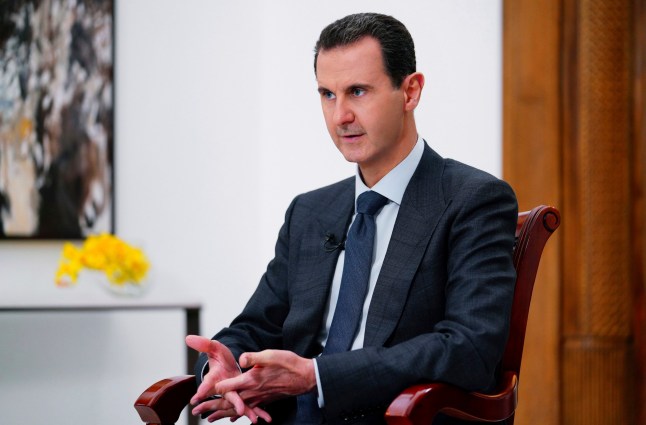 FILE – Dalam foto yang dipublikasikan pada 9 November 2019 oleh kantor berita resmi SANA, Presiden Bashar Assad saat itu berbicara di Damaskus, Suriah. (FILE SANA melalui AP, File)